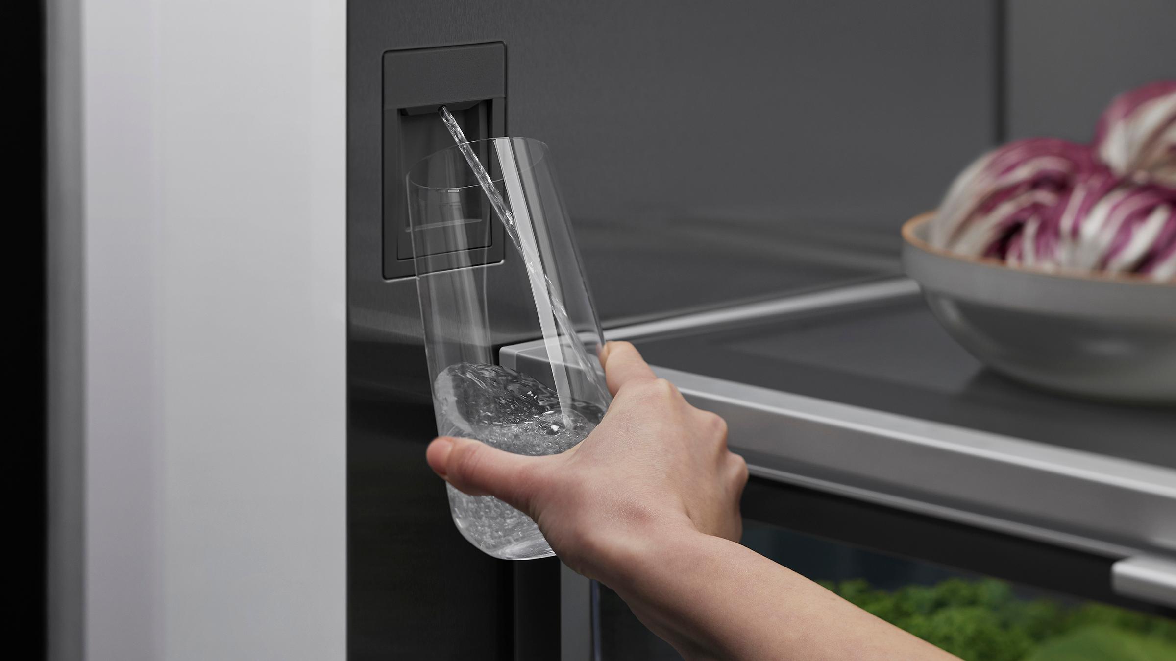Internal water and ice dispenser