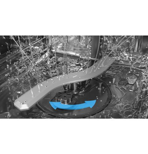 Reversing blade wash arm